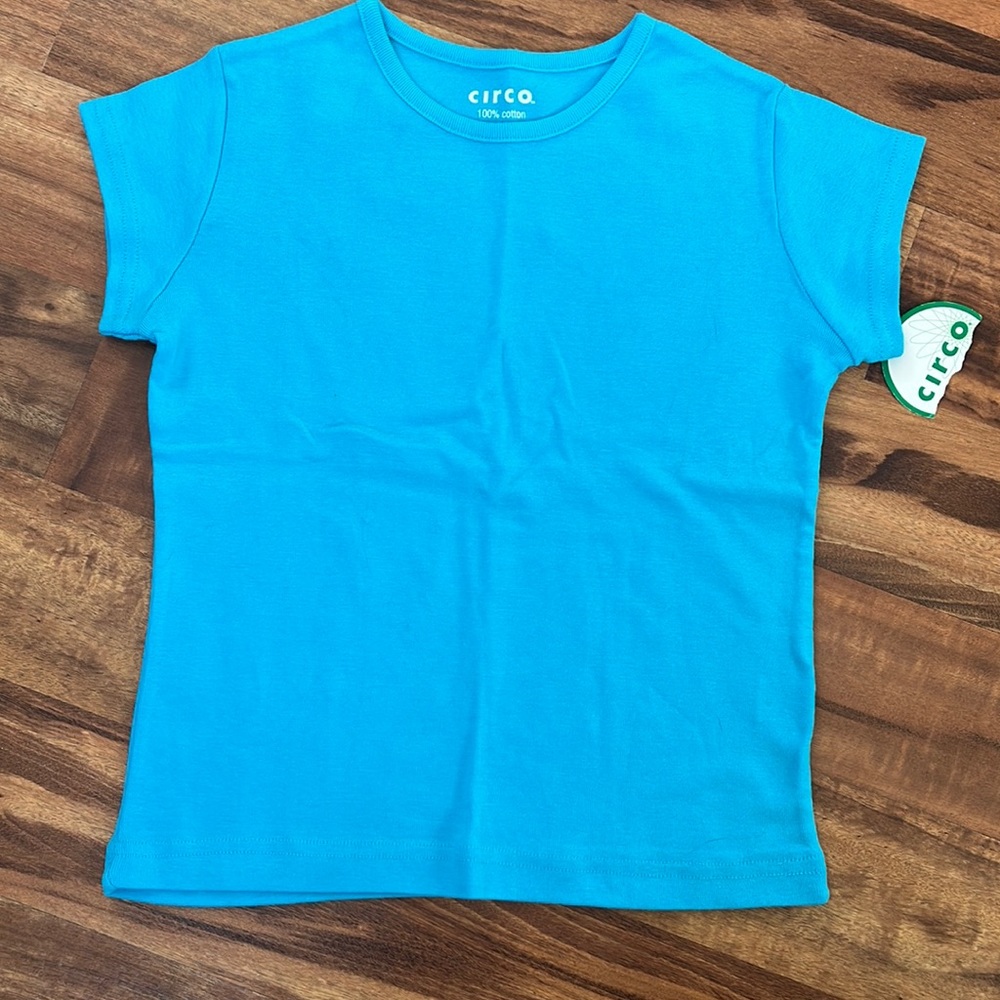 Girls turquoise short sleeve shirt size medium. NWT